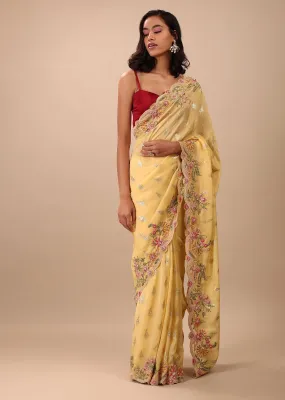 Canary Yellow Organza Saree With Brocade Buttis And Floral Embroidery In Zardosi