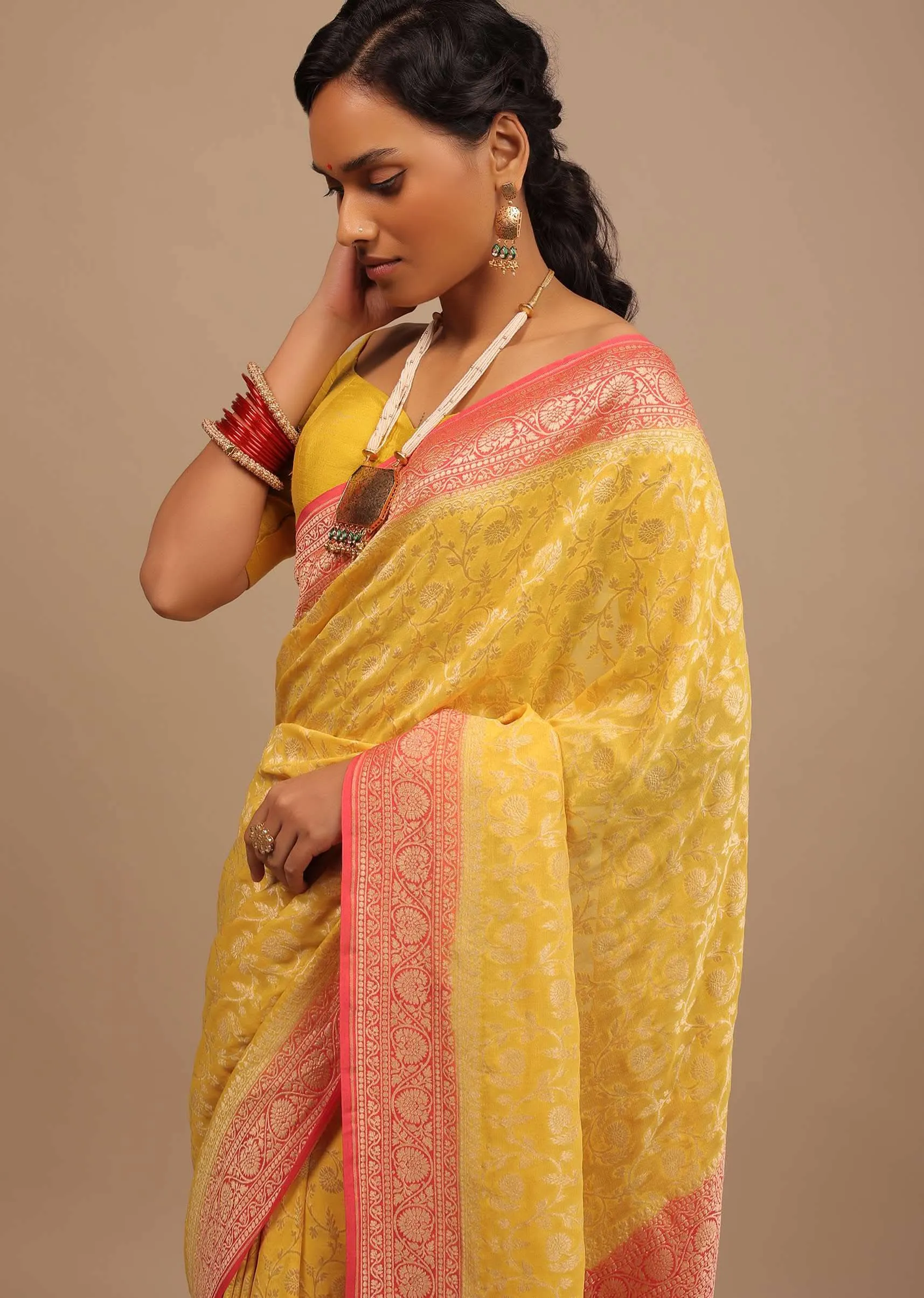 Canary Yellow Traditional Georgette Saree With Orange Brocade Border And Jaal Work