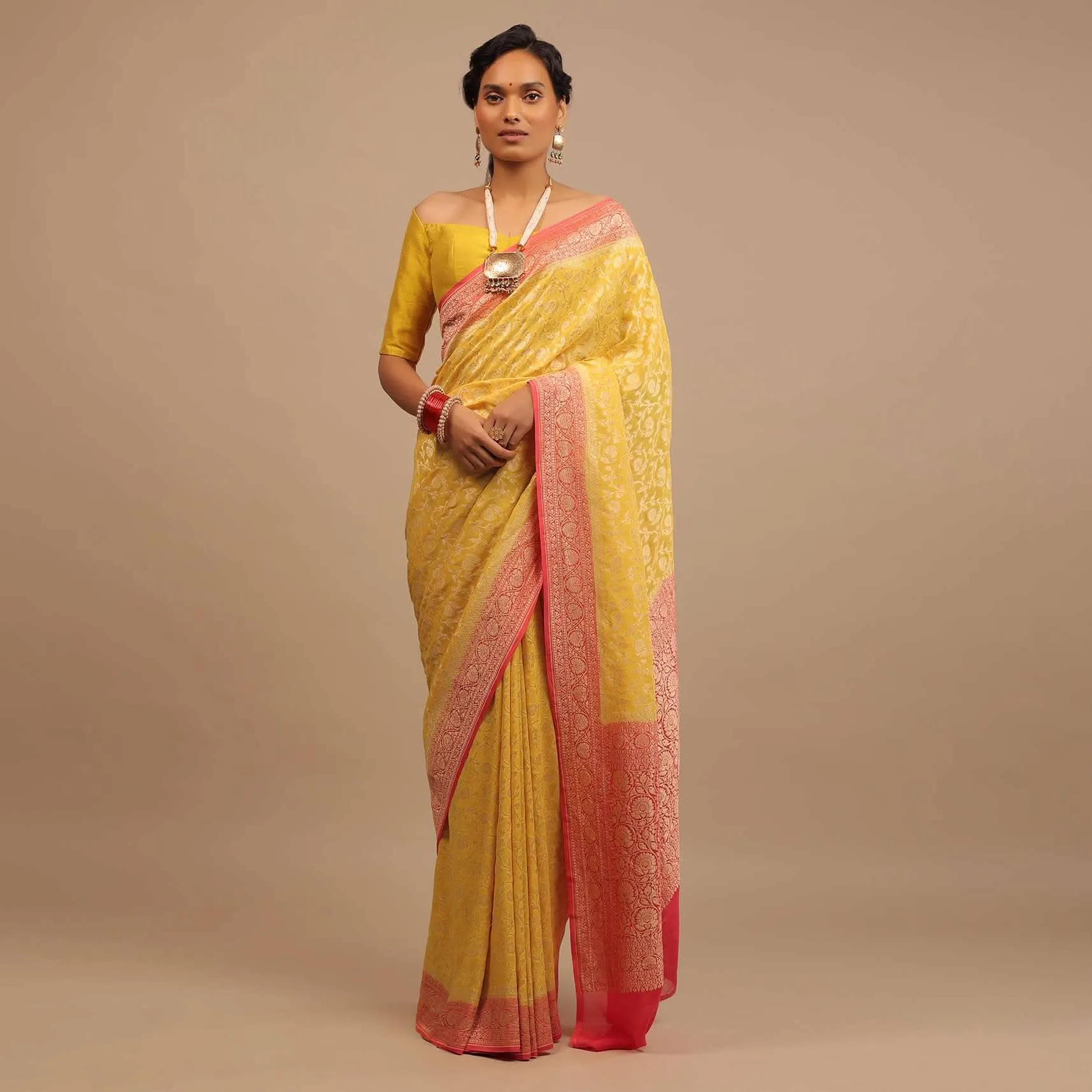 Canary Yellow Traditional Georgette Saree With Orange Brocade Border And Jaal Work