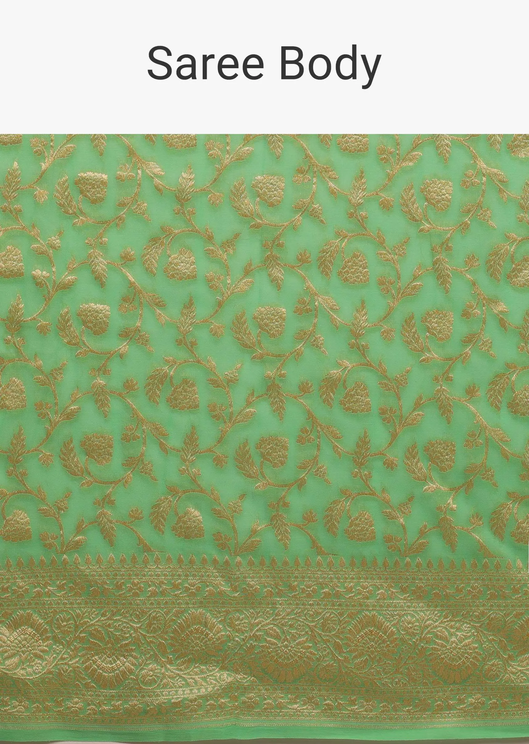 Jade Green Saree Made In Georgette And Beautified With Golden Jaal In A Floral Pattern